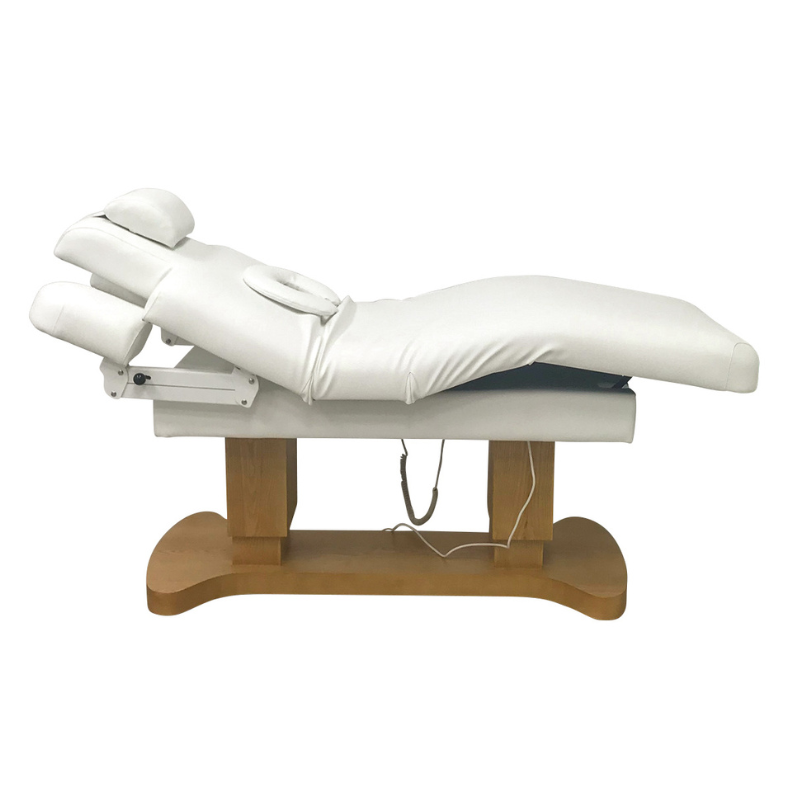 SUPREME Table de Massage et de Soins Électrique Chauffante - position semie- assise - revêtement blanc - base en bois laqué transparent - vue de coté - mobilier esthétique - meuble esthétique - malys equipements